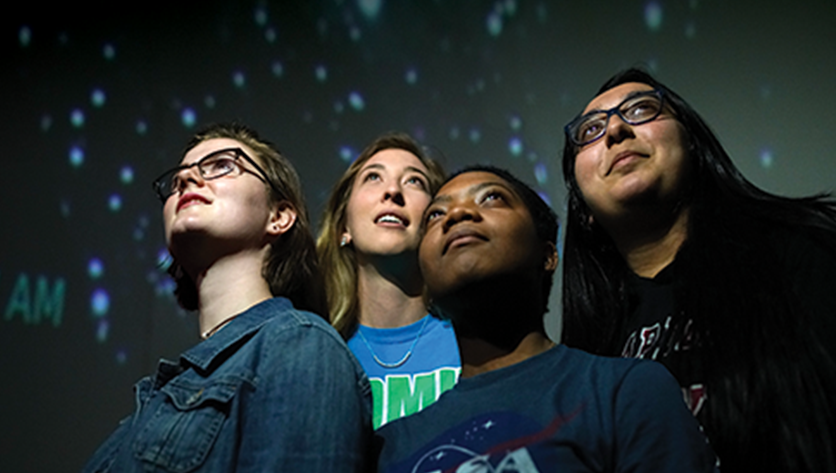 students in NDMU planetarium