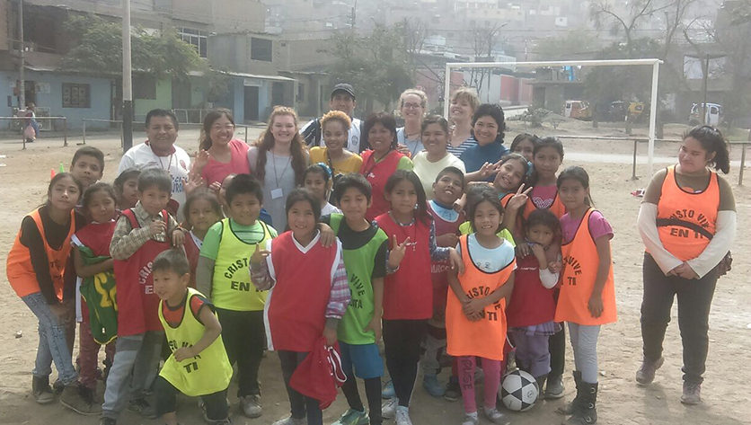 V Cox with students in Peru V Cox with students in Peru