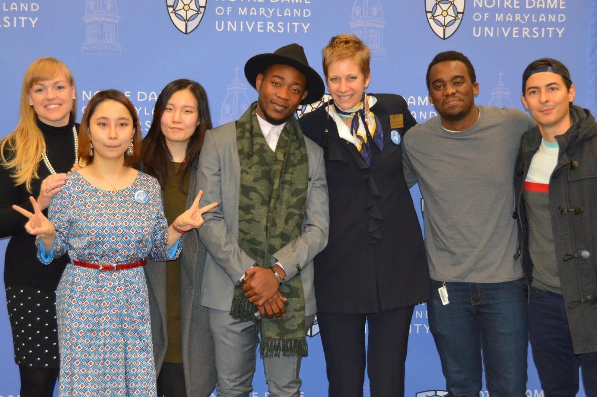 ELI staff and students pose for a photo during the ELI's 35th anniversary celebration.