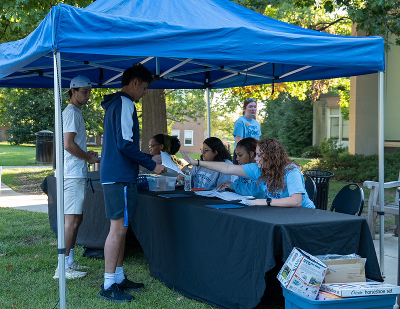 students checking in to move in at Doyle Hall