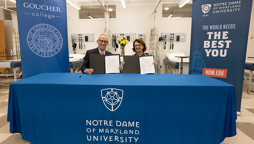 NDMU and Goucher's presidents at the MOU signing