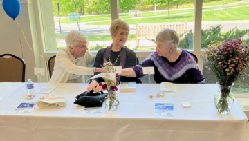Three women at a table