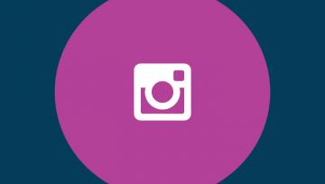 White Instagram logo in a magenta circle against a navy background