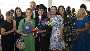 Brenda Rivera with her family at Commencement.