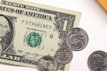 Dollar bill and change