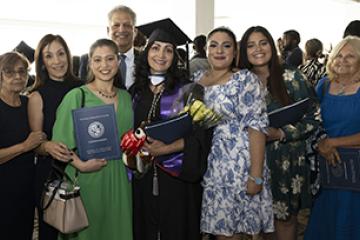 Brenda Rivera with her family at Commencement.