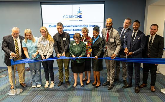 Staff, students, and government officials at the Ribbon Cutting ceremony