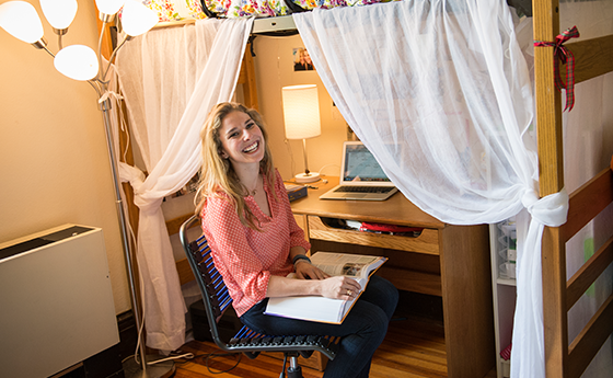 Student studying in her residence hall room