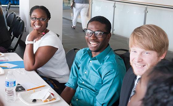 3 students near desk