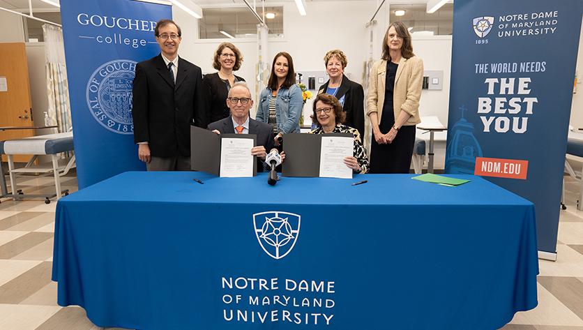 NDMU and Goucher administrators at the MOU signing