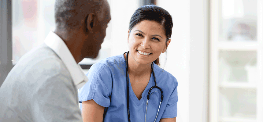 Nurse listening to an older patient