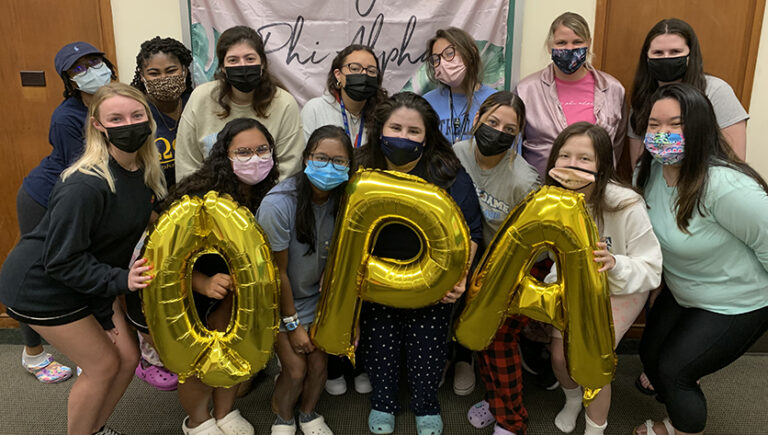 Students in Omega Phi Alpha Take on Service with International Reach