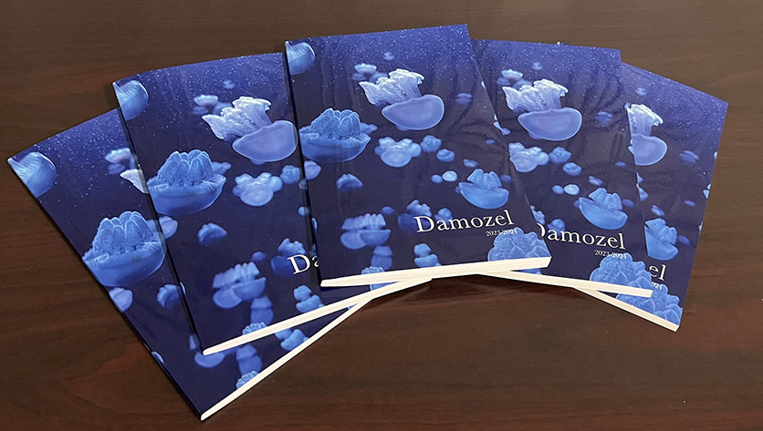 Damozel Wins First Place in National Literary Arts Journal Contest